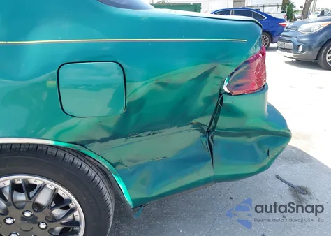 1998 Toyota Corolla Ve z USA, uszkodzony, nr VIN 1NXBR12E9WZ080912